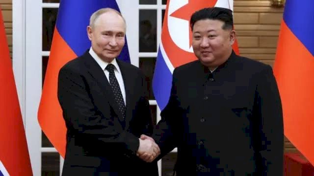 Vladimir Putin dan Kmi Jong Un.(F-INT)