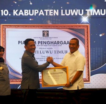 Bupati Lutim Ibas Terima Penghargaan Kemenkum Sulsel atas Pembentukan 100 Persen Posbankum
