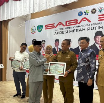 Bupati Irwan Terima Penghargaan Atas Dedikasi dalam Pembangunan KDMP