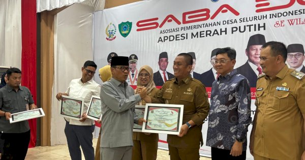 Bupati Irwan Terima Penghargaan Atas Dedikasi dalam Pembangunan KDMP